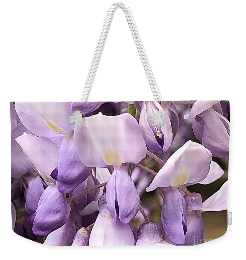 Wisteria Whimsy Weekender Tote Bag featuring the photograph Wisteria Whimsy by Carol Riddle