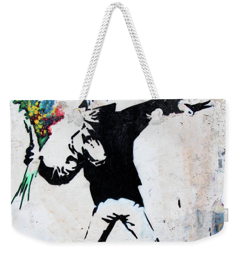 Banksy Replica Weekender Tote Bag featuring the photograph With Love and Flowers by Munir Alawi