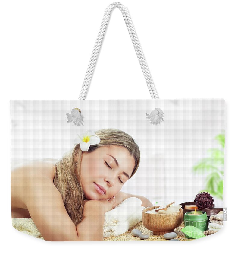 Adult Weekender Tote Bag featuring the photograph Woman relaxing at spa by Anna Om