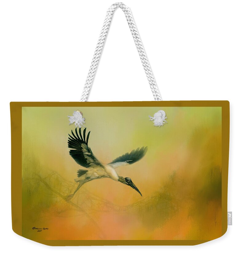 Birds Weekender Tote Bag featuring the photograph Wood Stork Encounter by Marvin Spates