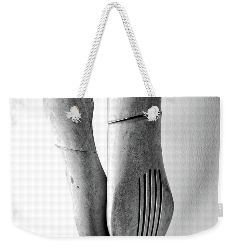 Black Weekender Tote Bag featuring the photograph Wooden Shoe Forms Black and White by Edward Fielding