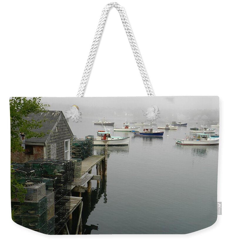 Evening View As Fog Sets In Of Harbor Full Of Working Lobster Boats. Weekender Tote Bag featuring the photograph Working Lobster Harbor by Deborah Ferree