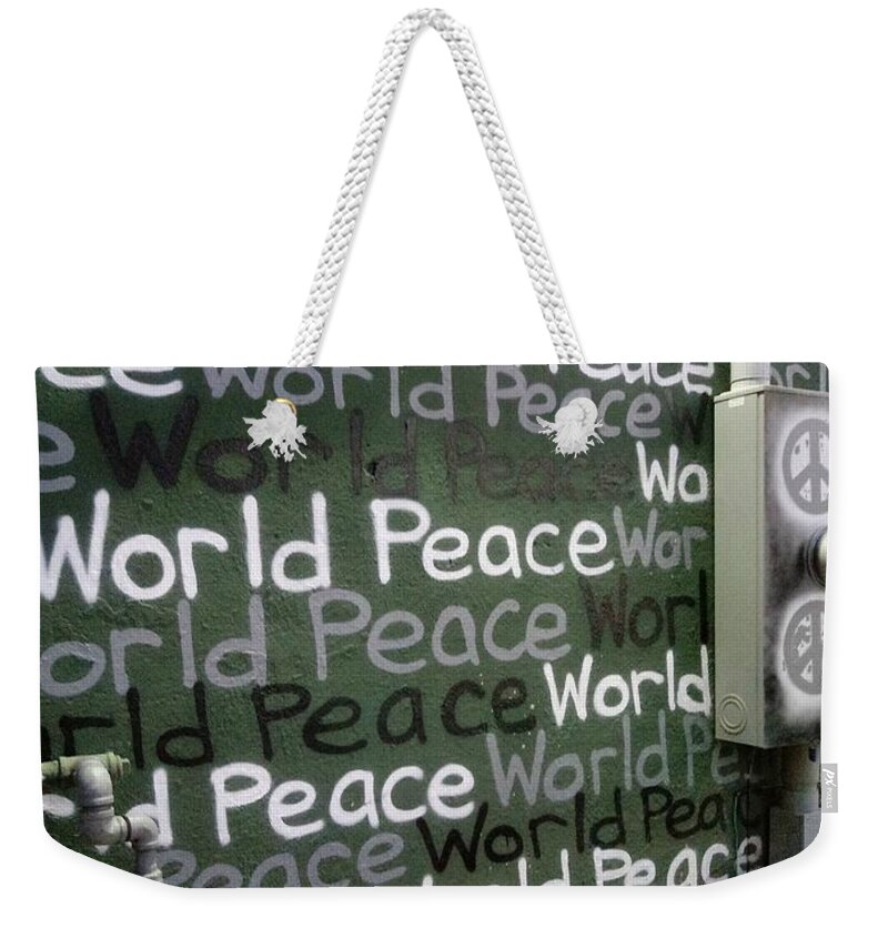 Graffiti Weekender Tote Bag featuring the photograph World Peace Graffiti by Kathy Barney