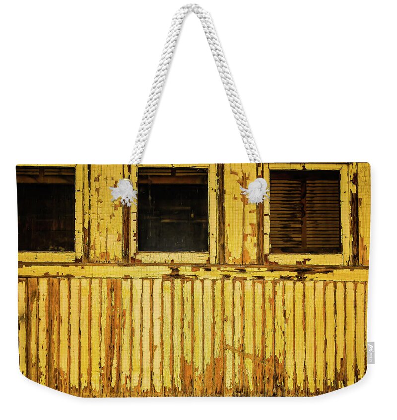 Virgina & Truckee Weekender Tote Bag featuring the photograph Worn Yellow Passanger Car by Garry Gay