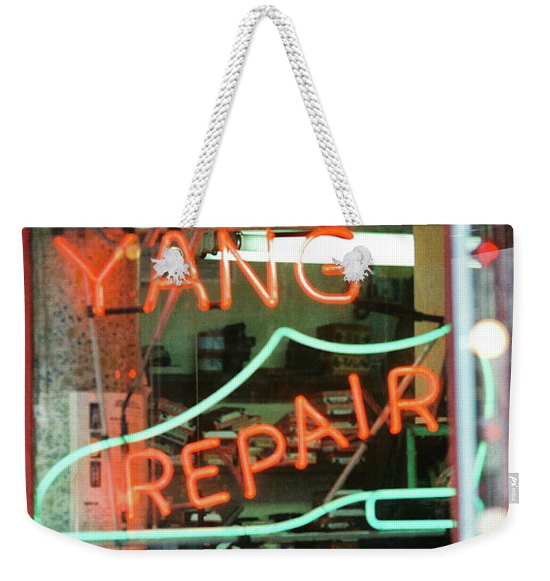 Color Weekender Tote Bag featuring the photograph Yang Repair by Frank DiMarco