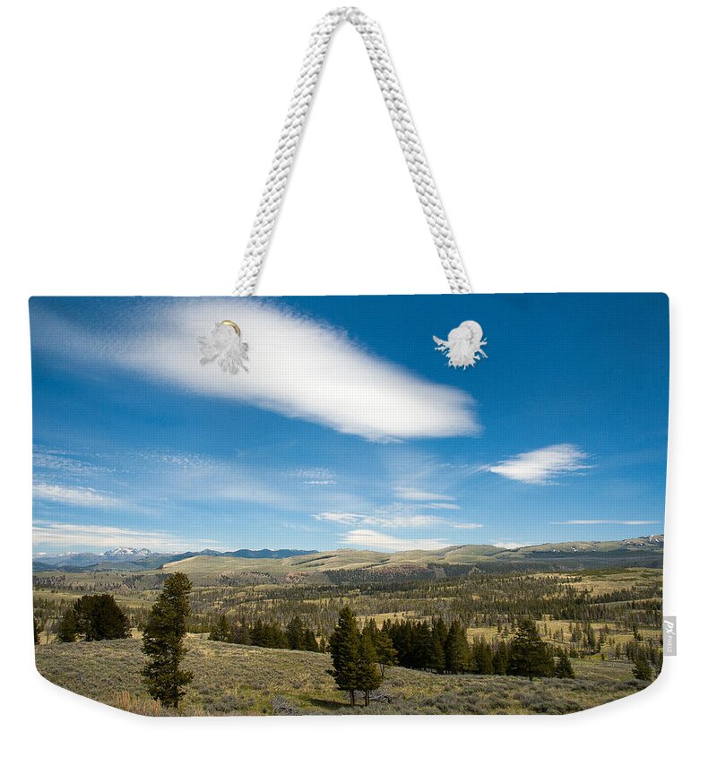 Yellowstone Weekender Tote Bag featuring the photograph Yellowstone Skies by Steve Stuller