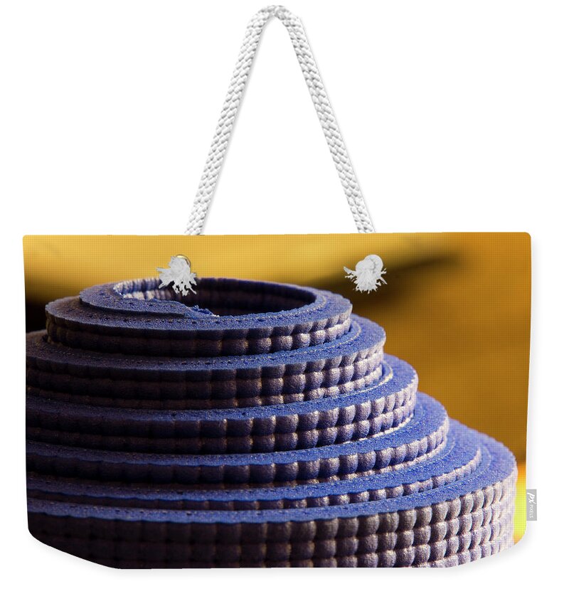 Yoga Weekender Tote Bag featuring the photograph Yoga mat by Karen Smale