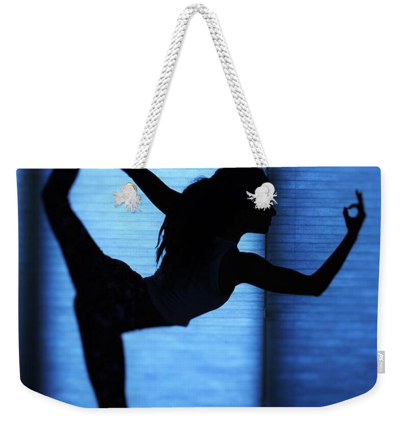 Female Yoga Weekender Tote Bag featuring the photograph Yoga by Tom Hufford