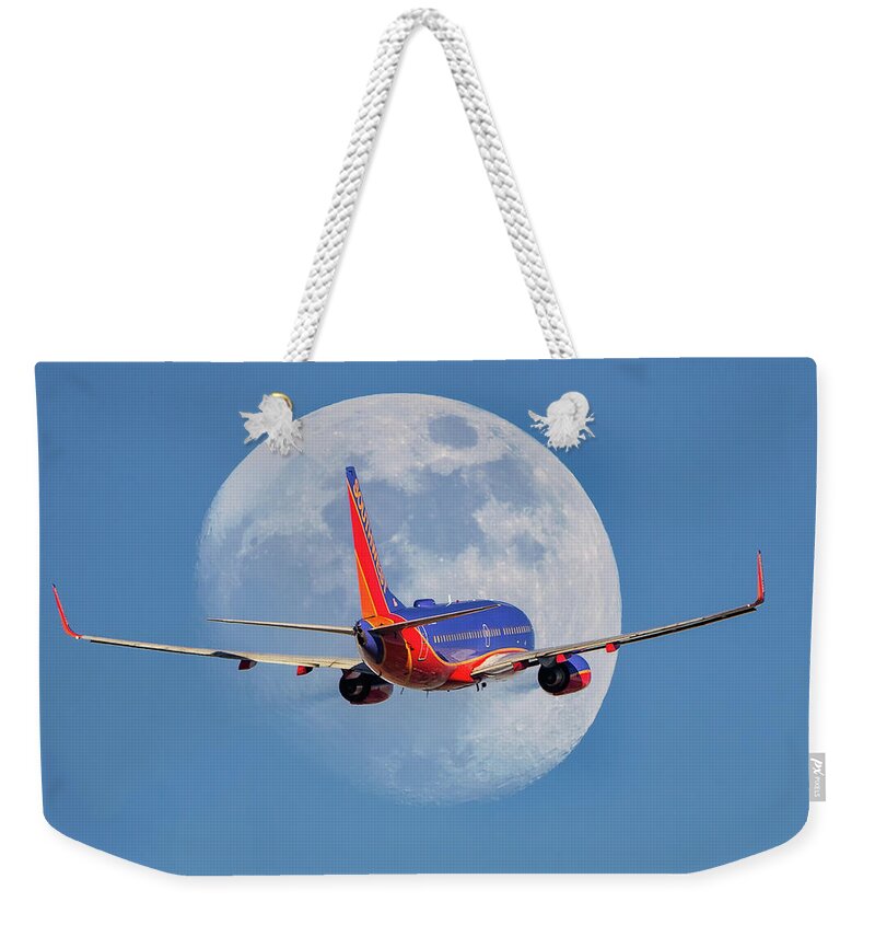 Boeing Weekender Tote Bag featuring the photograph You Are Now Free To Move About The Universe by Jay Beckman