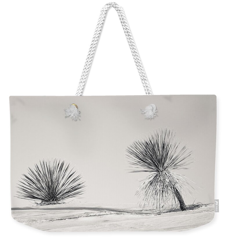 Yucca Weekender Tote Bag featuring the photograph yucca in White sands by Ralf Kaiser