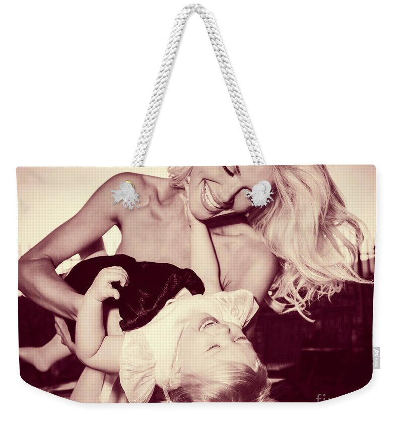2 People Weekender Tote Bag featuring the photograph 0181 Model Selena and daughter by Amyn Nasser