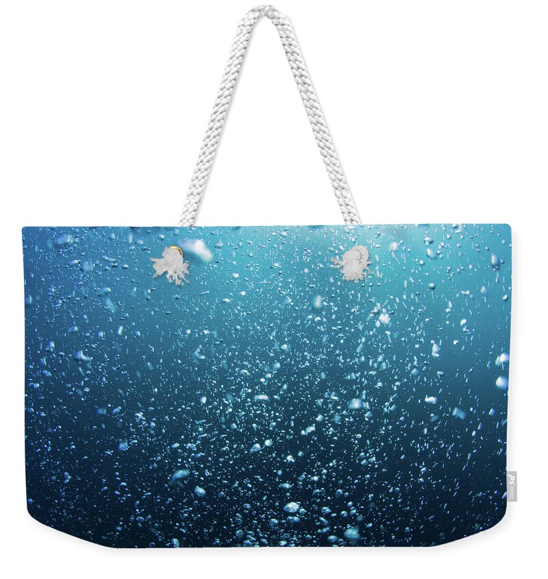 Underwater Weekender Tote Bag featuring the photograph Bubbles #1 by Mutlu Kurtbas