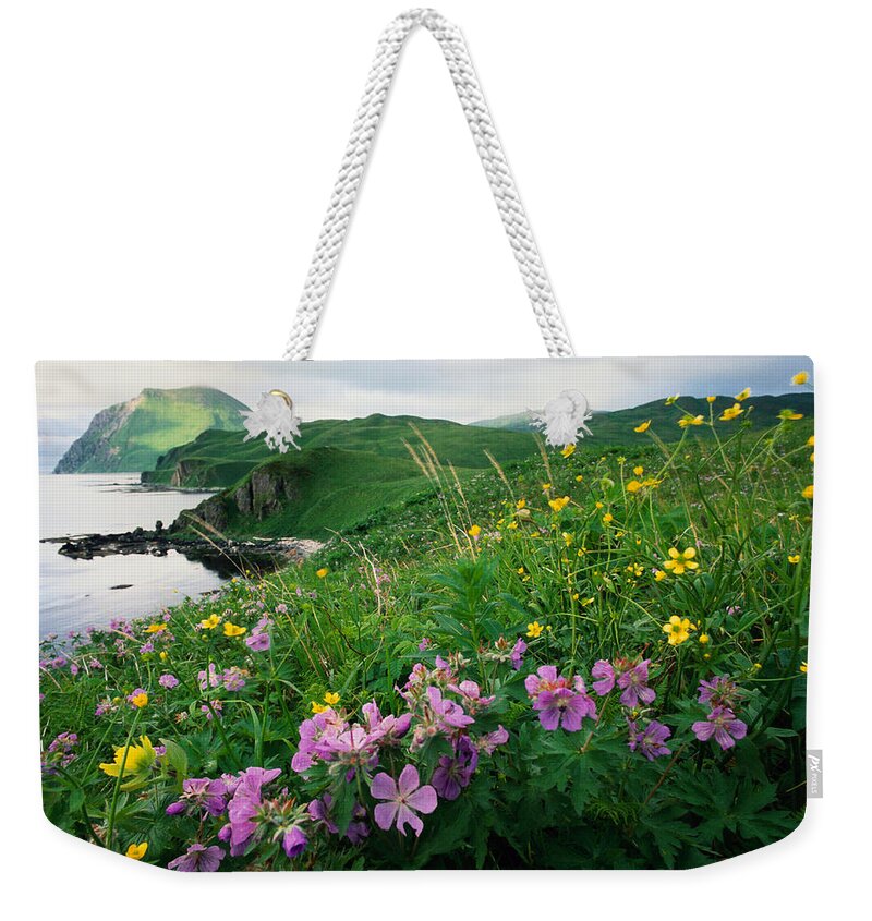 Scenics Weekender Tote Bag featuring the photograph Coastal Paintbrush And Wild Geranium #1 by Art Wolfe