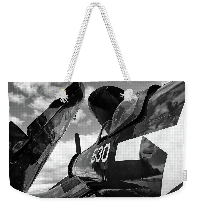 Corsair Weekender Tote Bag featuring the photograph Corsair with Folded Wings #1 by Chris Buff