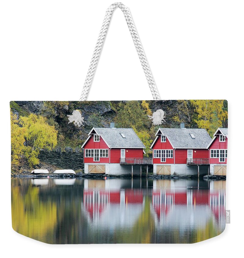 Built Structure Weekender Tote Bag featuring the photograph Fishing Huts #1 by Alexandrumagurean