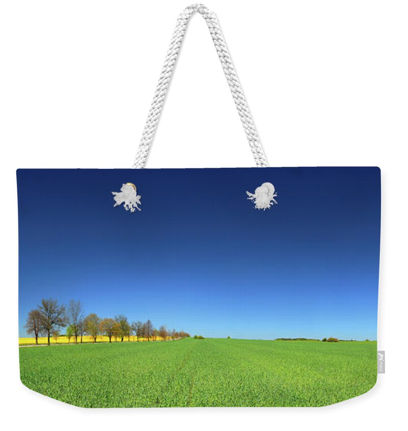 Scenics Weekender Tote Bag featuring the photograph Green Field Landscape #1 by Konradlew