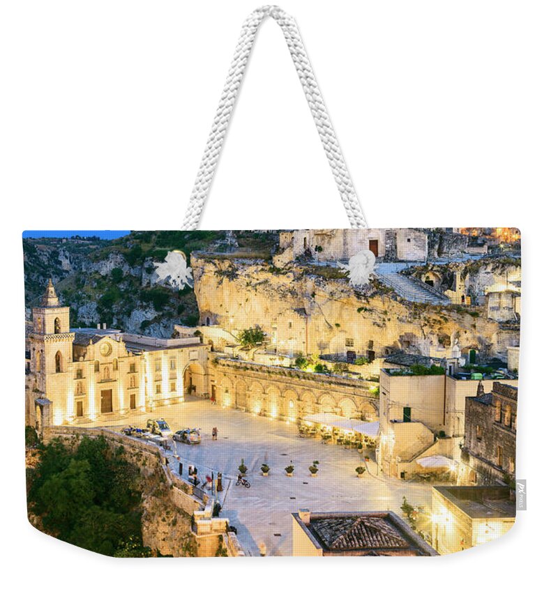 Estock Weekender Tote Bag featuring the digital art Italy, Basilicata, Matera District, Matera, Sassi Di Matera, The Typical Districts Of The Old Town Carved Out Of The Rocks #1 by Luigi Vaccarella