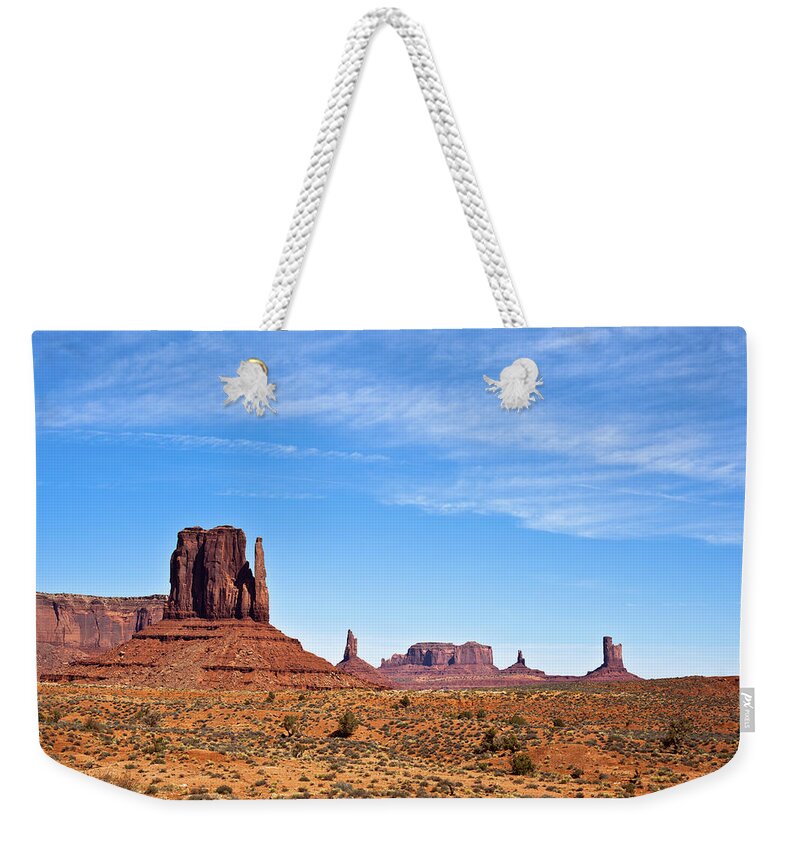 Scenics Weekender Tote Bag featuring the photograph Monument Valley #1 by Moreiso