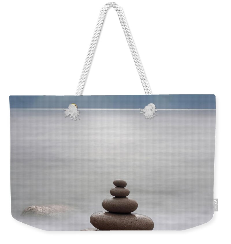 Tranquility Weekender Tote Bag featuring the photograph Pebbles, Kimmeridge Bay, Dorset, Uk #1 by Travelpix Ltd