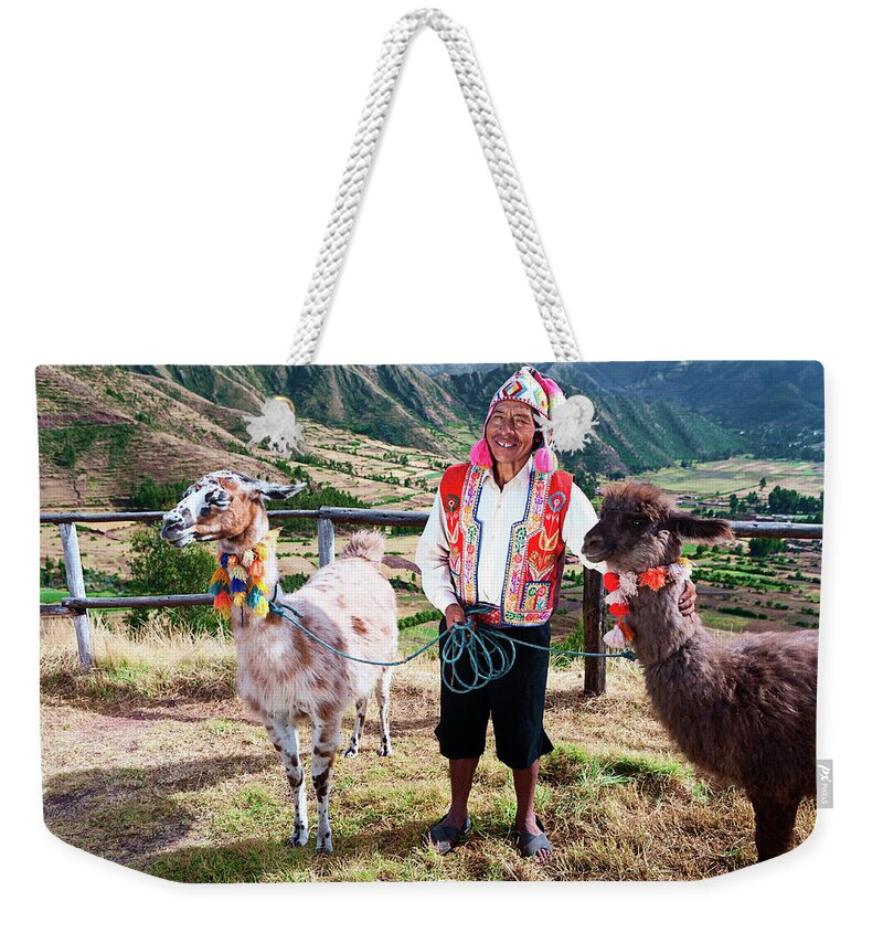 Working Animal Weekender Tote Bag featuring the photograph Portrait Of Peruvian Man Near Pisac #1 by Hadynyah
