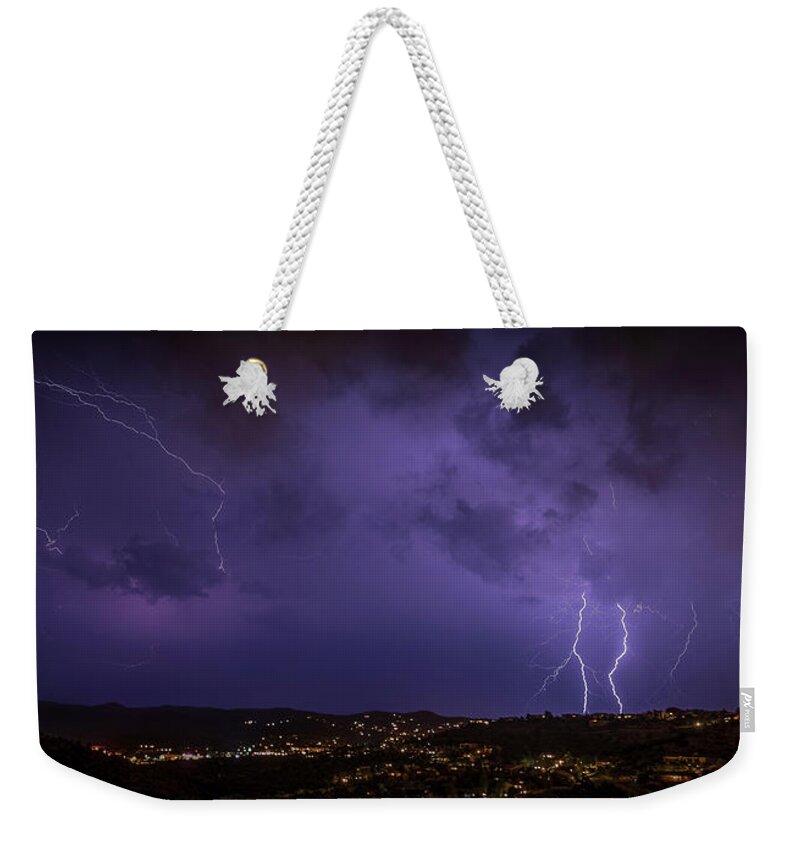Lightning Weekender Tote Bag featuring the photograph Purple Skies #1 by Aaron Burrows