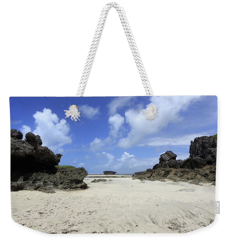 Scenics Weekender Tote Bag featuring the photograph Rocks On The Beach, Watamu Marine #1 by Vincenzo Lombardo