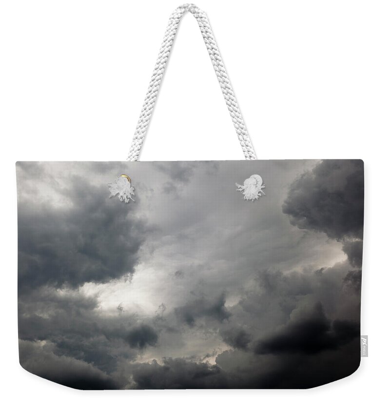 Scenics Weekender Tote Bag featuring the photograph Stormy Clouds #1 by Mariusfm77