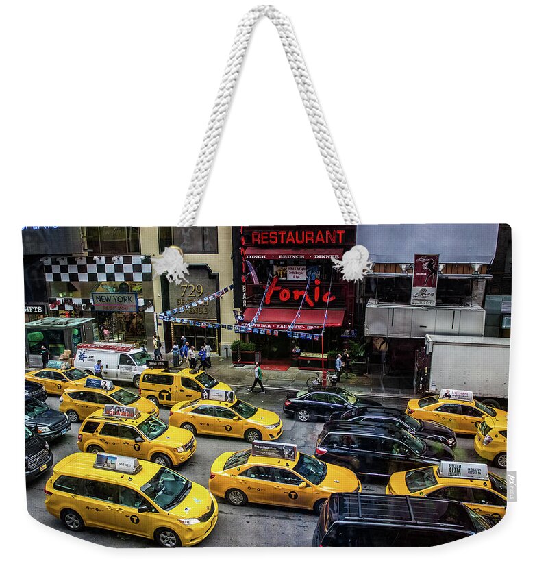 Yellow Weekender Tote Bag featuring the photograph Taxi #1 by Martin Newman