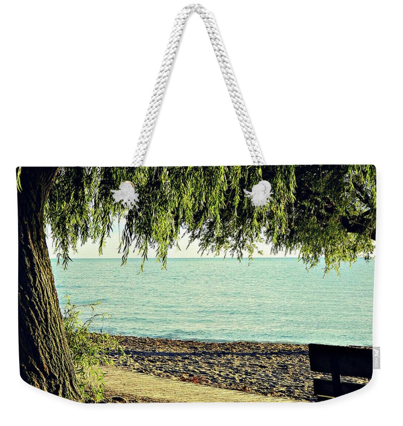 The Lonely Spot Weekender Tote Bag featuring the photograph The Lonely Spot #1 by Cyryn Fyrcyd