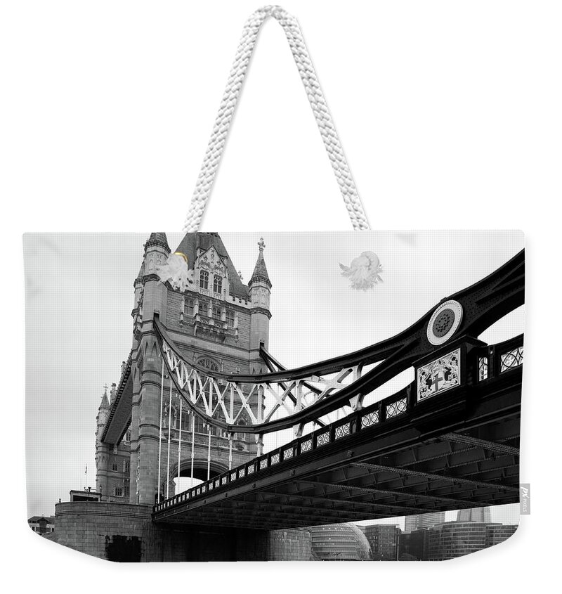 London Weekender Tote Bag featuring the photograph Tower Bridge in Black and White #1 by Ian Middleton