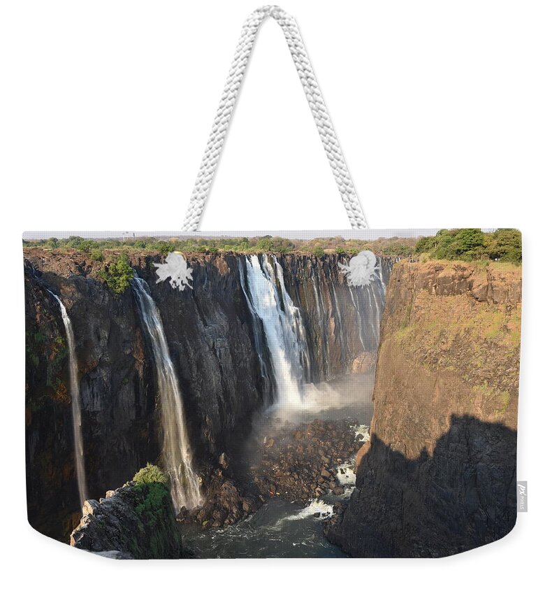 Waterfall Weekender Tote Bag featuring the photograph Victoria Falls by Ben Foster