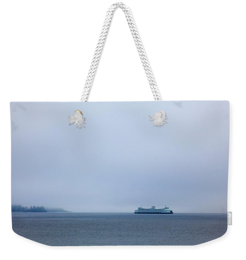 Tranquility Weekender Tote Bag featuring the photograph View Of Ferry On Puget Sound #1 by Mel Curtis