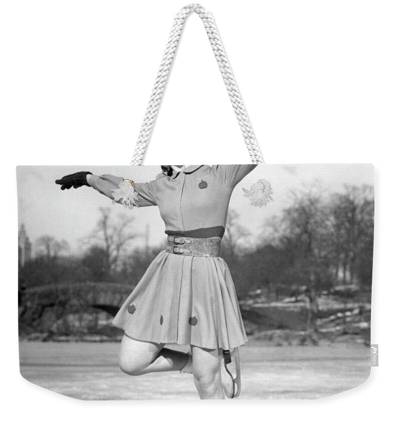 People Weekender Tote Bag featuring the photograph Woman Ice Skating #1 by George Marks