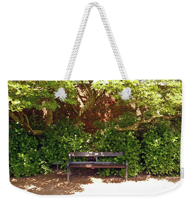 Chorley Weekender Tote Bag featuring the photograph 11/05/19 CHORLEY. Astley Hall. Walled Garden. Sunlit Bench. by Lachlan Main