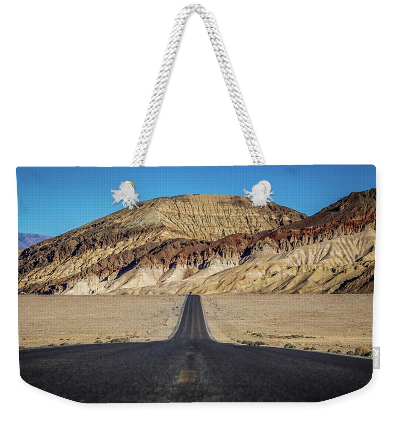 Road Weekender Tote Bag featuring the photograph Lonely Road In Death Valley National Park In California #12 by Alex Grichenko