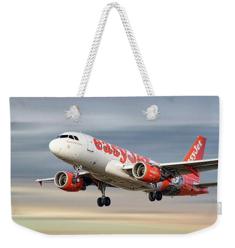 Easyjet Weekender Tote Bag featuring the mixed media EasyJet Airbus A319-111 #15 by Smart Aviation