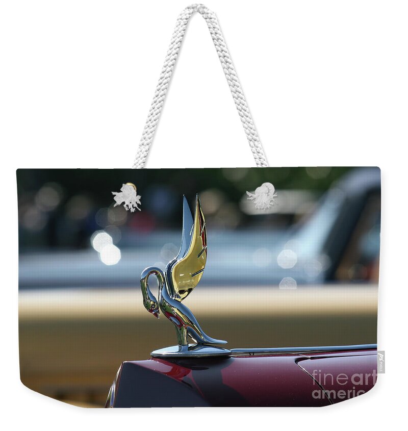 Vintage Weekender Tote Bag featuring the photograph 1937 Packard Cormorant Hood Ornament by Lucie Collins