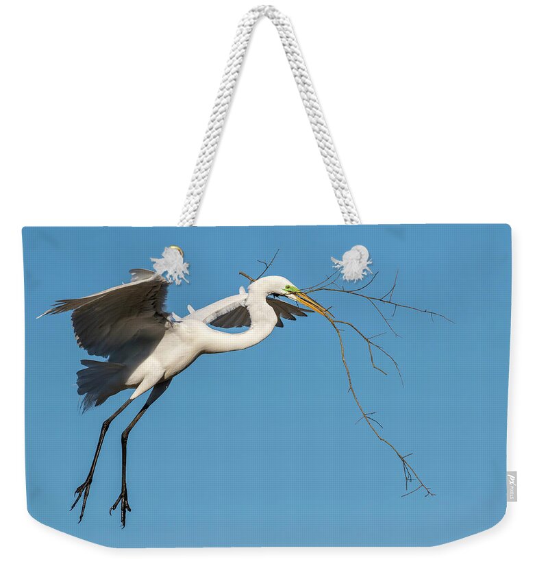 American Fauna Weekender Tote Bag featuring the photograph Great Egret With Stick #2 by Ivan Kuzmin