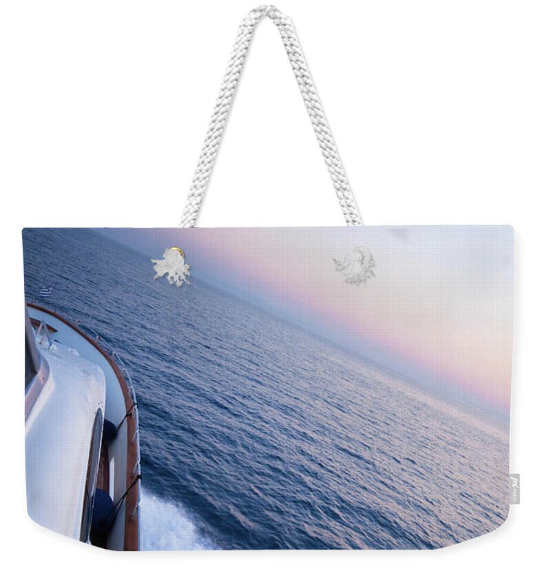 Motorboat Weekender Tote Bag featuring the photograph Luxury Motor Yacht Sailing At Sunset #2 by Petreplesea