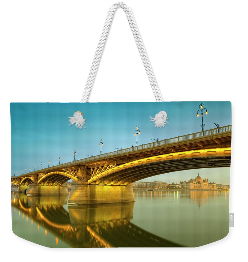 Town Weekender Tote Bag featuring the photograph Margaret Bridge And The Parliament #2 by Focusstock