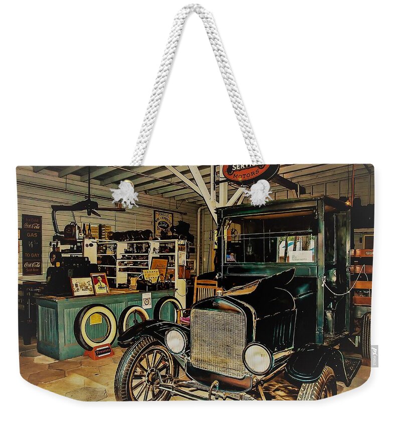 Tires Weekender Tote Bag featuring the photograph My Garage by Randy Sylvia