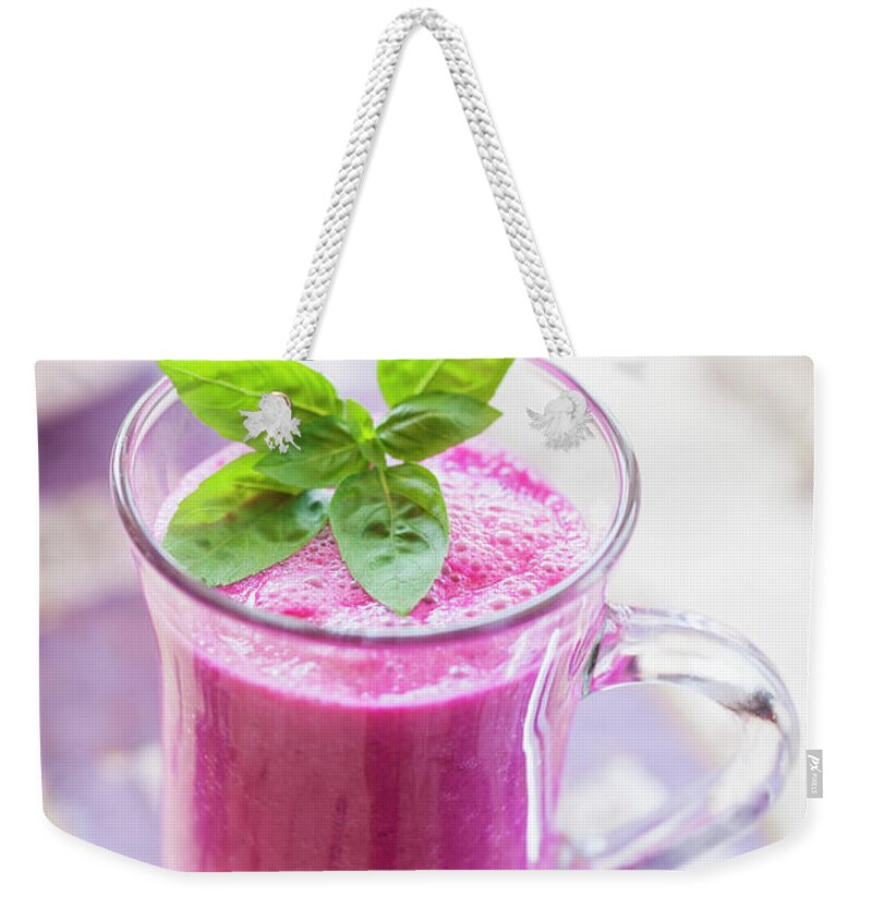 Purple Weekender Tote Bag featuring the photograph Red Smoothie #2 by Drbouz