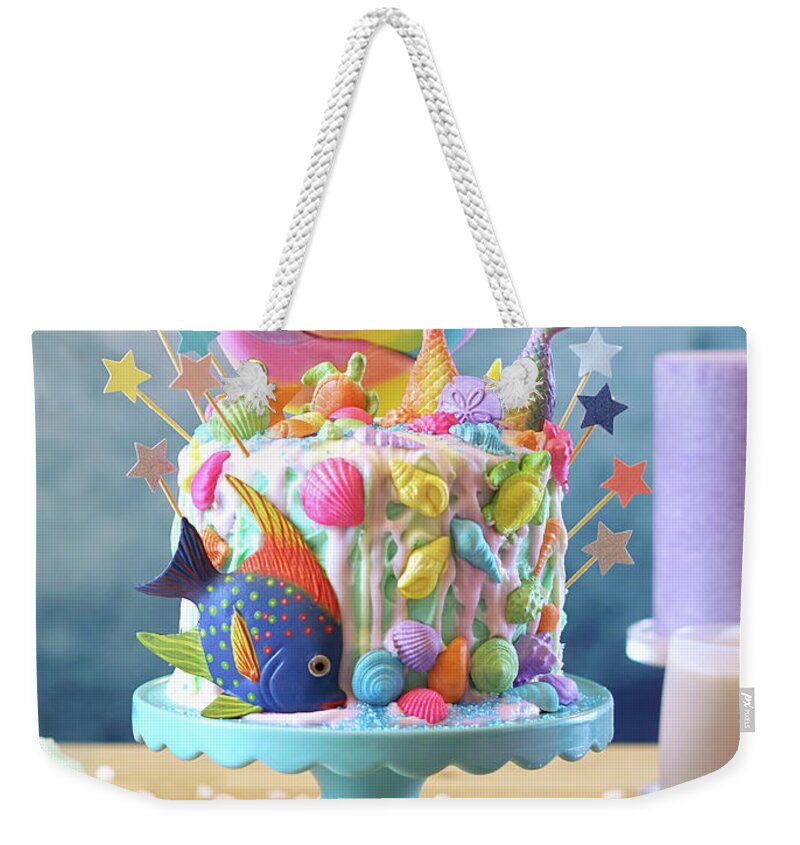 Mermaid Weekender Tote Bag featuring the photograph Mermaid theme candyland cake with glitter tails, shells and sea creatures. #3 by Milleflore Images