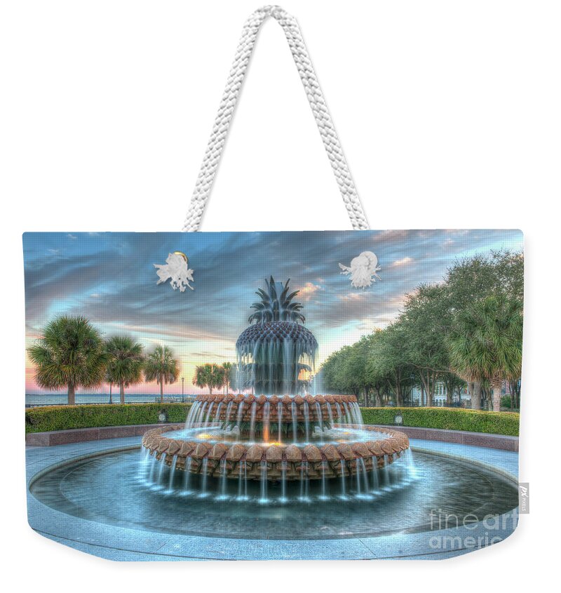 Pineapple Fountain Weekender Tote Bag featuring the photograph Pineapple Sunset over Charleston South Carolina by Dale Powell