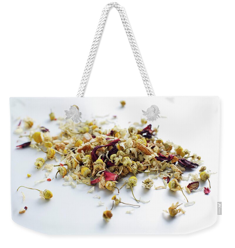 White Background Weekender Tote Bag featuring the photograph Close Up Of Pile Of Tea Leaves #5 by Brett Stevens