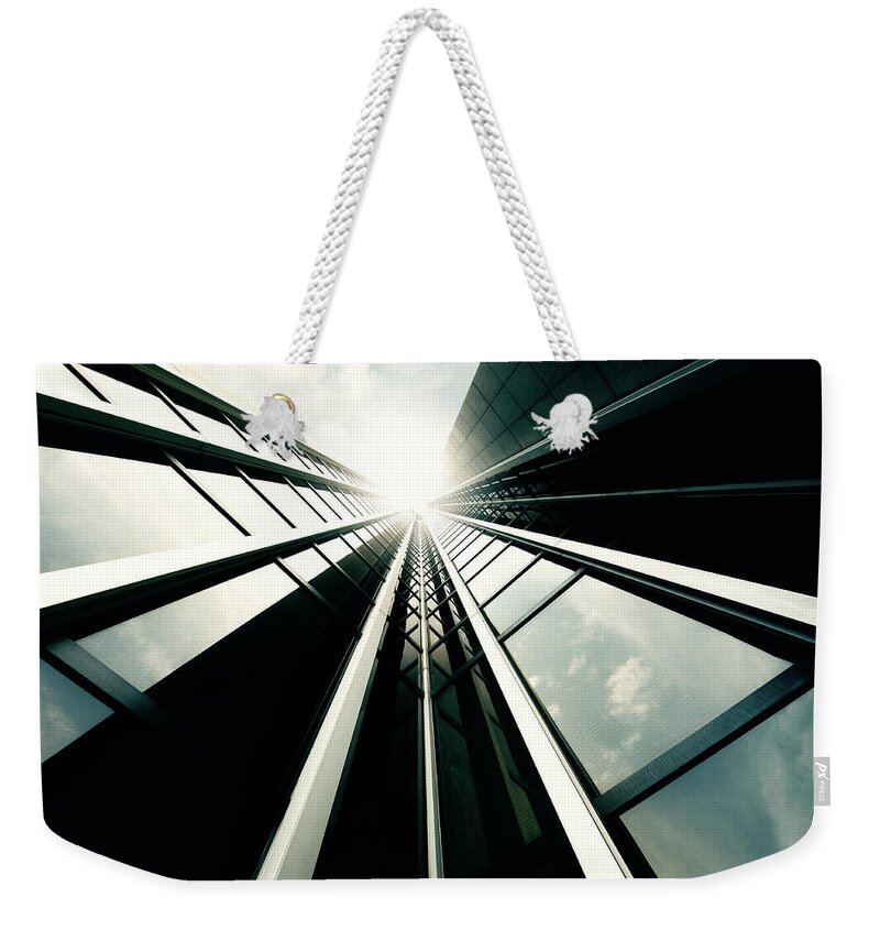 Working Weekender Tote Bag featuring the photograph Futuristic Office Building #7 by Ppampicture