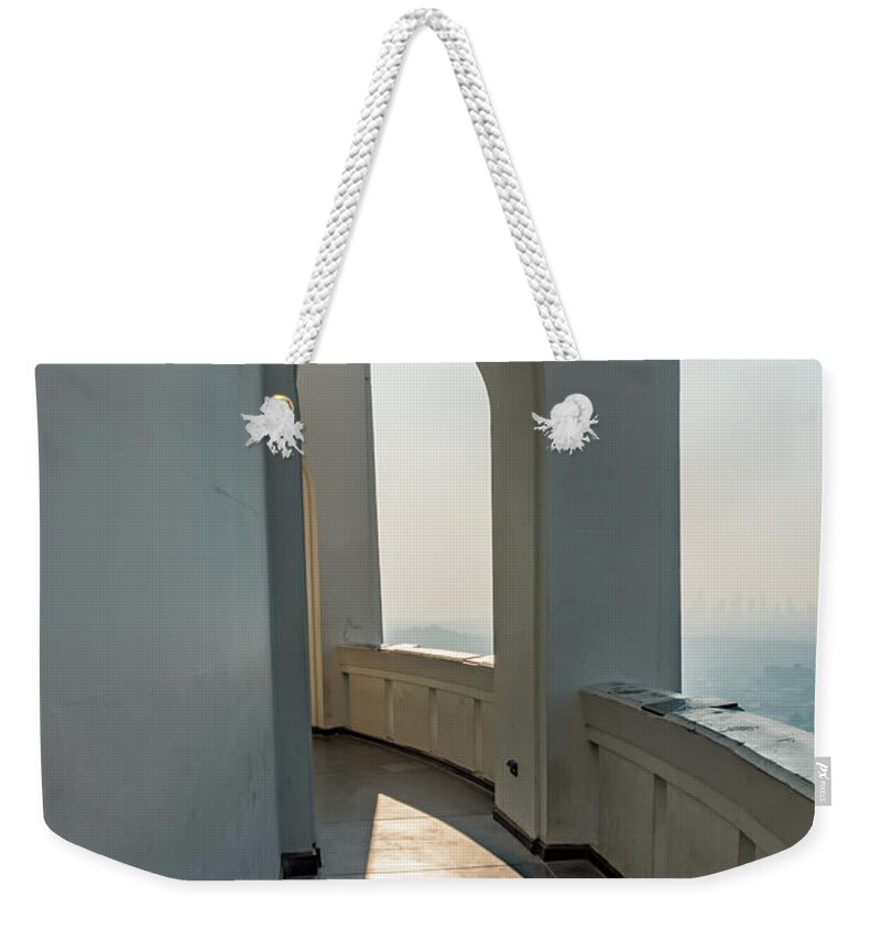 Famous Weekender Tote Bag featuring the photograph Famous Griffith observatory in Los Angeles california #8 by Alex Grichenko