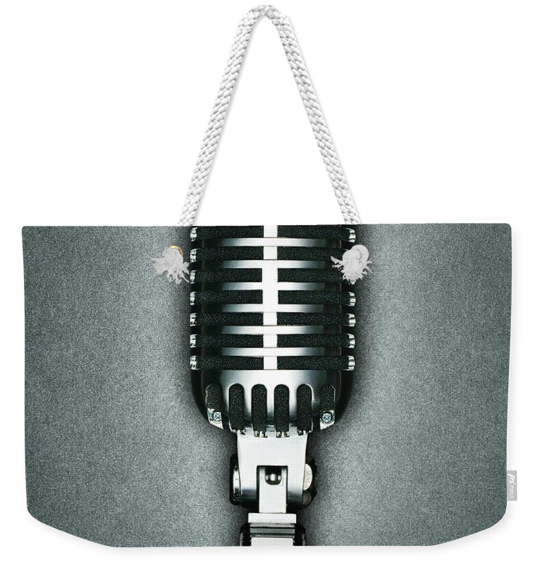 Performance Weekender Tote Bag featuring the photograph A Classic Microphone by Jonathan Kitchen