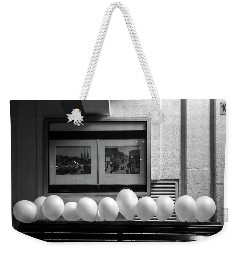 Urban Scenes Weekender Tote Bag featuring the photograph A Dozen White Balloons at 107 by Mary Lee Dereske