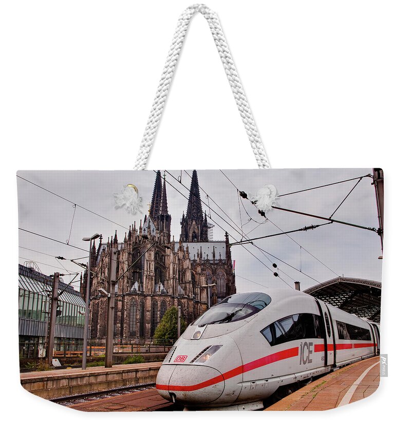 Gothic Style Weekender Tote Bag featuring the photograph A German Ice High Speed Train In by Julian Elliott Photography